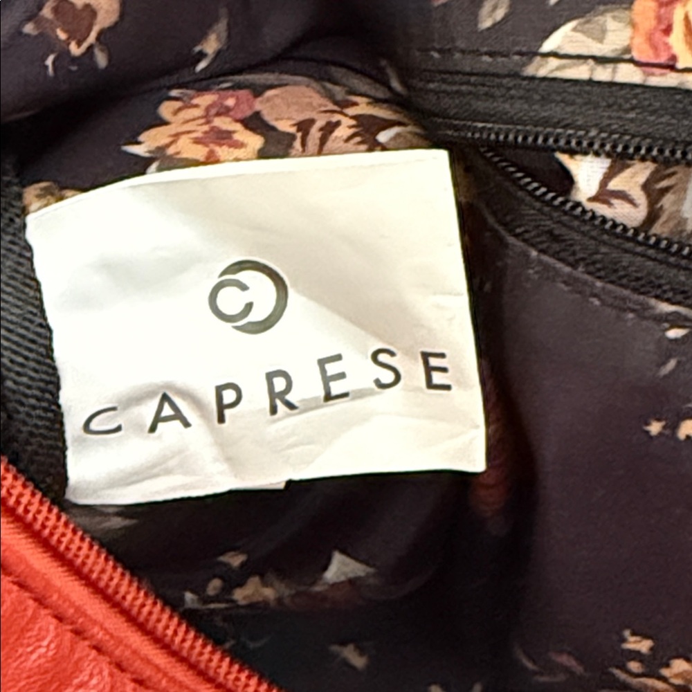 CAPRESE Stylish Red Handbag with Eyelet Design - Picture 13 of 16